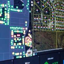 Computer screen showing status of homes during a natural disaster