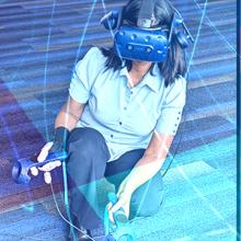 Four Tech to Protect participants code in collaboration at a table filled with laptops, a Haptics Challenge judge tests virtual reality simulations, a FirstNet Authority speaker at TEEX UnderFire gestures in front of an audience Four Tech to Protect participants code in collaboration at a table filled with laptops, a Haptics Challenge judge tests virtual reality simulations, a FirstNet Authority speaker at TEEX UnderFire gestures in front of an audience