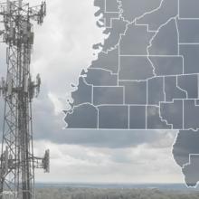 The State of Mississippi, with outlined county borders; a cell tower.