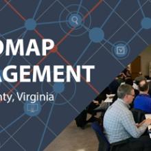 On the right, adults in a workshop style classroom listen to a female speaker standing in front of a presentation, on the left are the words "Roadmap Engagement Fairfax, Virginia" and a graphic of a stylized network