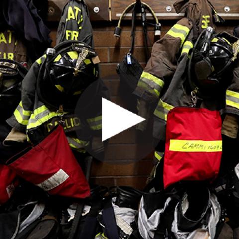 Fire gear hangs on a shelf