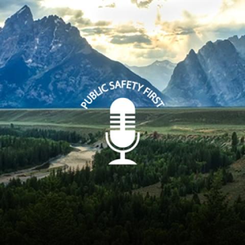  Mountain range with forest; Public Safety First podcast logo
