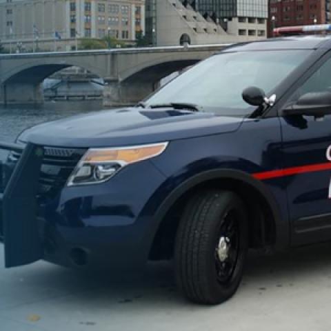Grand Rapids police vehicle and Grand Rapids skyline