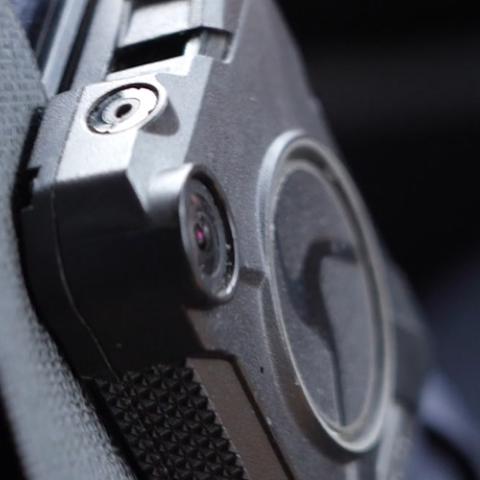 Up close view of a body camera worn by a law enforcement officer