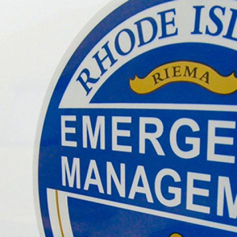 The Rhode Island Emergency Management Agency logo on a truck.