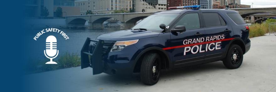 Grand Rapids police vehicle and Grand Rapids skyline