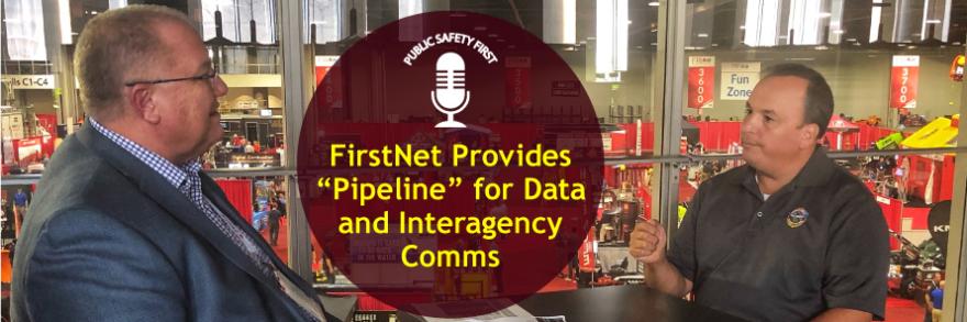FirstNet Authority Senior Public Safety Advisor Gary McCarraher sits across from Chief Charles Doody of the Canton (MA) Fire Department with fire expo displays in background; Public Safety First podcast logo; “FirstNet Provides “Pipeline” for Data and Interagency Comms”