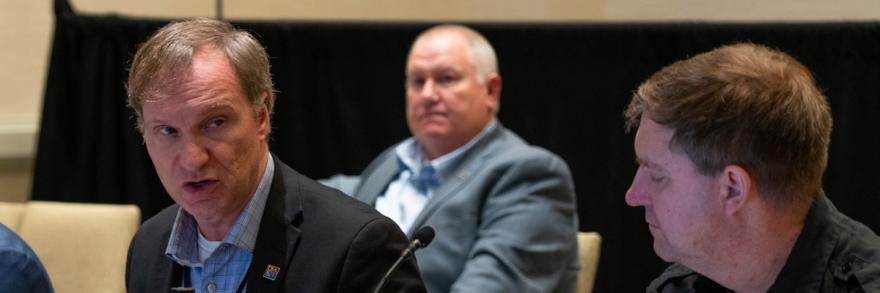 First Responder Network Authority Executive Director and CEO Joe Wassel speaking at a meeting attended by FirstNet Authority staff and public safety officials. 