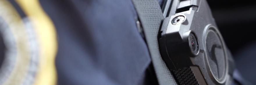 Up close view of a body camera worn by a law enforcement officer