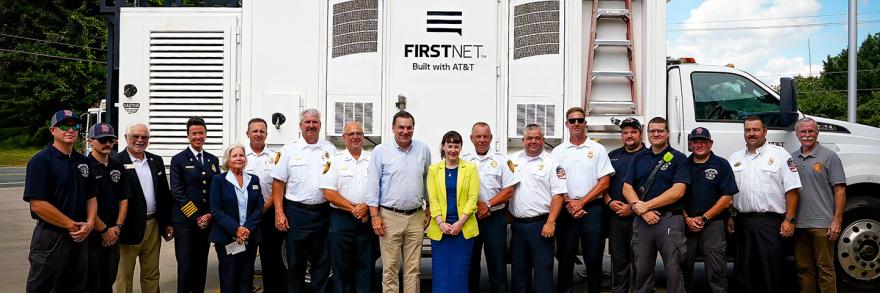 Congressman Richard Hudson, Assistant Secretary of Commerce for Communications and Technology Arielle Roth, and Elon, North Carolina first responders; FirstNet SatCOLT