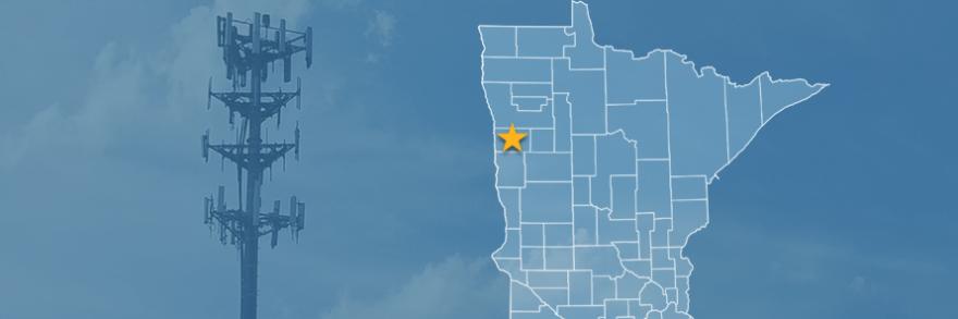 State of Minnesota with counties outlined; a star marking Norman County; a cell tower 