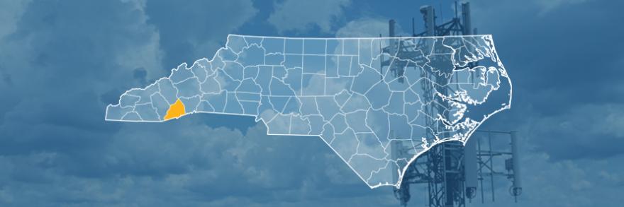 The state of North Carolina, with outlined county borders; a cell tower