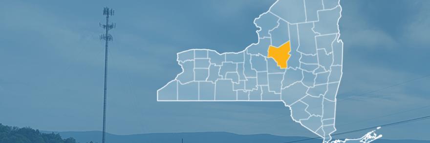 State of New York with counties outlined; highlighting Oneida County, a cell tower