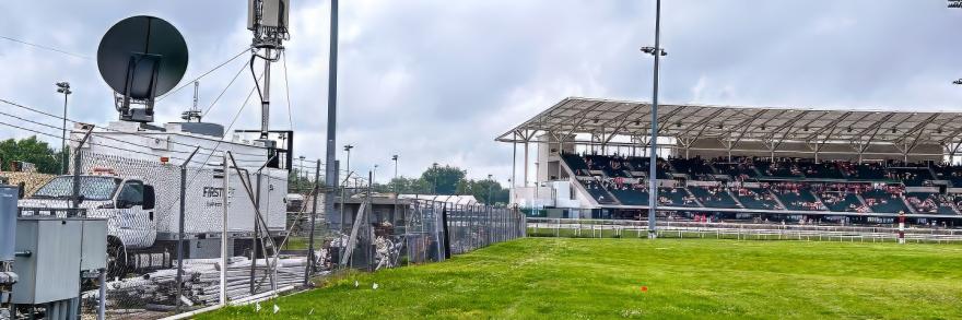 A FirstNet SatCOLT near the fence around the infield of Churchill Downs for the Kentucky Derby