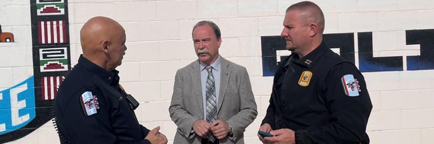 FirstNet Authority staff discusses broadband opportunities with officers from the Laguna Police Department in New Mexico