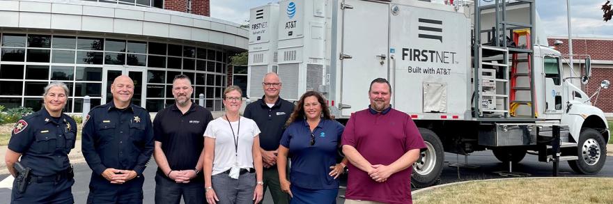 Winnebago County Sheriff’s Office, FirstNet Authority and FirstNet Built with AT&T and AT&T personnel in front of a SatCOLT outside.