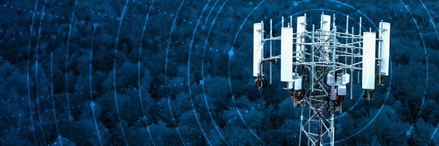 A FirstNet cell site, radiating network graphic overlay emerges from tower