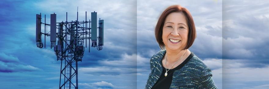  A cell tower against the backdrop of clouds with a headshot of a woman, Teri Takai. 