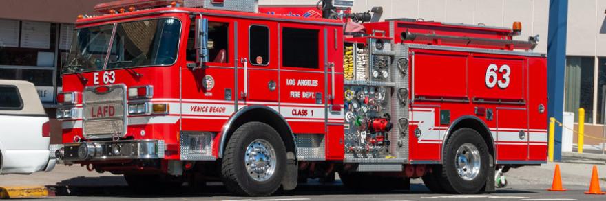 A Los Angeles Fire Department truck sits on the street.