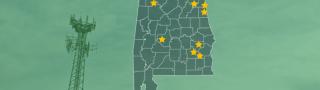 The State of Alabama, with outlined county borders; a cell tower.