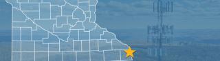 State of Minnesota with counties outlined; a star locating Hokah, a cell tower