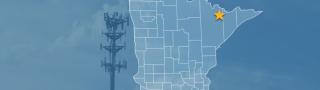 The state of Minnesota, with outlined county borders and a star locating Echo Trail, Minnesota; a cell tower.