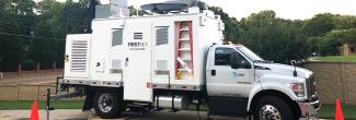 A FirstNet SatCOLT parked near a field during a response