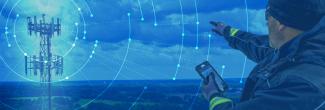A network radiates from a tower, a responder holding a smartphone points towards the tower