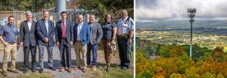 U.S. Congressman Rob Bresnahan with FirstNet Authority personnel, local first responders, public safety officials, and community leaders standing in front of new FirstNet cell tower site; aerial view of the new, rural tower in Luzerne County, Pennsylvania