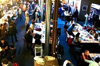 A large crowd works at FirstNet's first public safety hack-a-thon in San Francisco March 23-24, 2018.