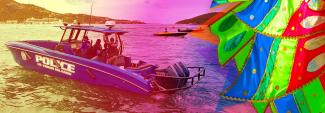 US Virgin Island Police speedboat on water in marina; yellow and pink transparent overlay merging into colorful carnival costume fabric