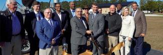 FirstNet Authority staff, Congressman G.K. Butterfield (NC-1), and local leaders cut a ribbon near new FirstNet site in Wayne County North Carolina