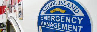 The Rhode Island Emergency Management Agency logo on a truck.