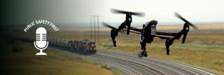 Drone flying over moving train