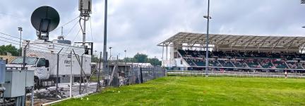 A FirstNet SatCOLT near the fence around the infield of Churchill Downs for the Kentucky Derby