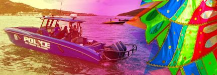US Virgin Island Police speedboat on water in marina; yellow and pink transparent overlay merging into colorful carnival costume fabric